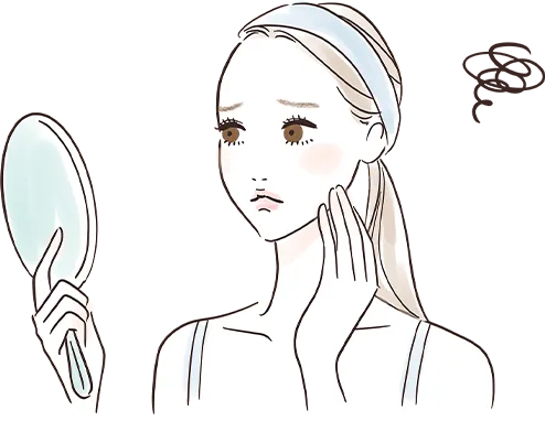 困った表情の女性